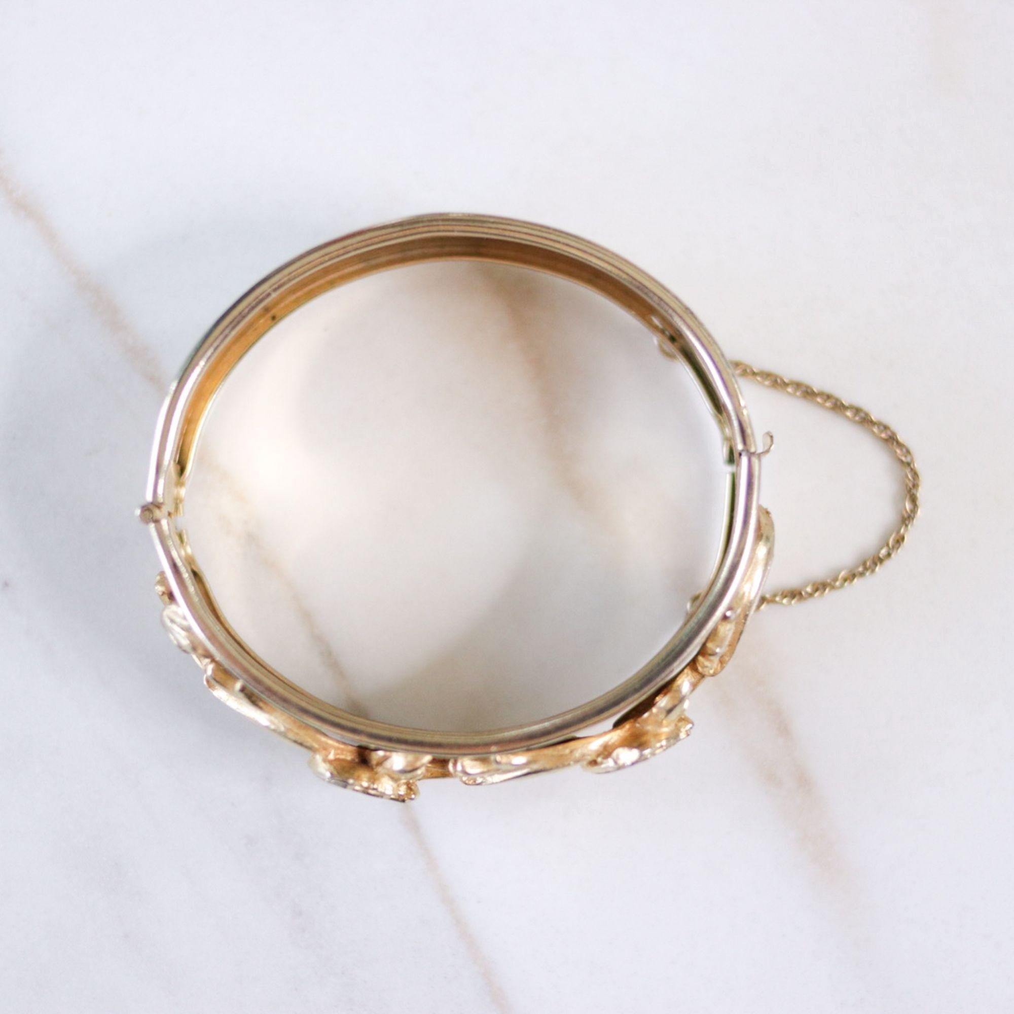 Vintage Heraldic Gold Hinged Bangle Bracelet by Unsigned Beauty - Vintage Meet Modern Vintage Jewelry - Chicago, Illinois - #oldhollywoodglamour #vintagemeetmodern #designervintage #jewelrybox #antiquejewelry #vintagejewelry
