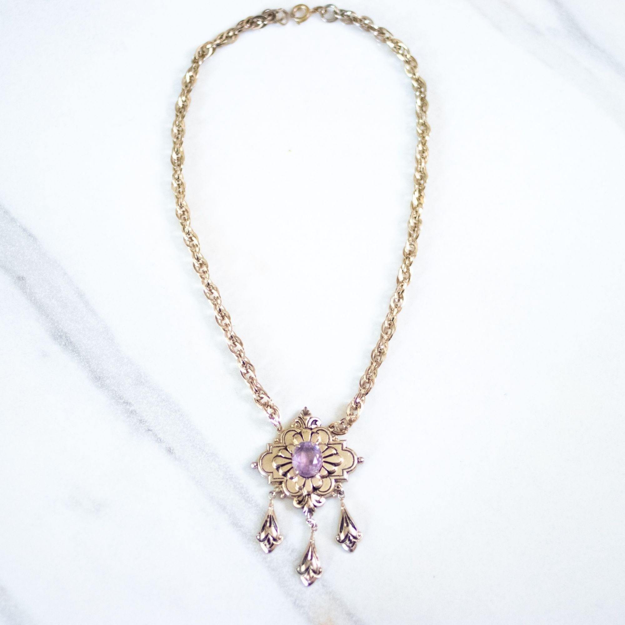 Vintage Coro Purple Crystal Gold Lavalier with Dangling Charms Necklace by Coro - Vintage Meet Modern Vintage Jewelry - Chicago, Illinois - #oldhollywoodglamour #vintagemeetmodern #designervintage #jewelrybox #antiquejewelry #vintagejewelry