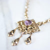 Vintage Coro Purple Crystal Gold Lavalier with Dangling Charms Necklace by Coro - Vintage Meet Modern Vintage Jewelry - Chicago, Illinois - #oldhollywoodglamour #vintagemeetmodern #designervintage #jewelrybox #antiquejewelry #vintagejewelry