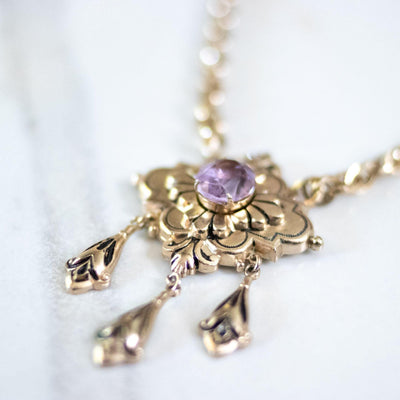 Vintage Coro Purple Crystal Gold Lavalier with Dangling Charms Necklace by Coro - Vintage Meet Modern Vintage Jewelry - Chicago, Illinois - #oldhollywoodglamour #vintagemeetmodern #designervintage #jewelrybox #antiquejewelry #vintagejewelry