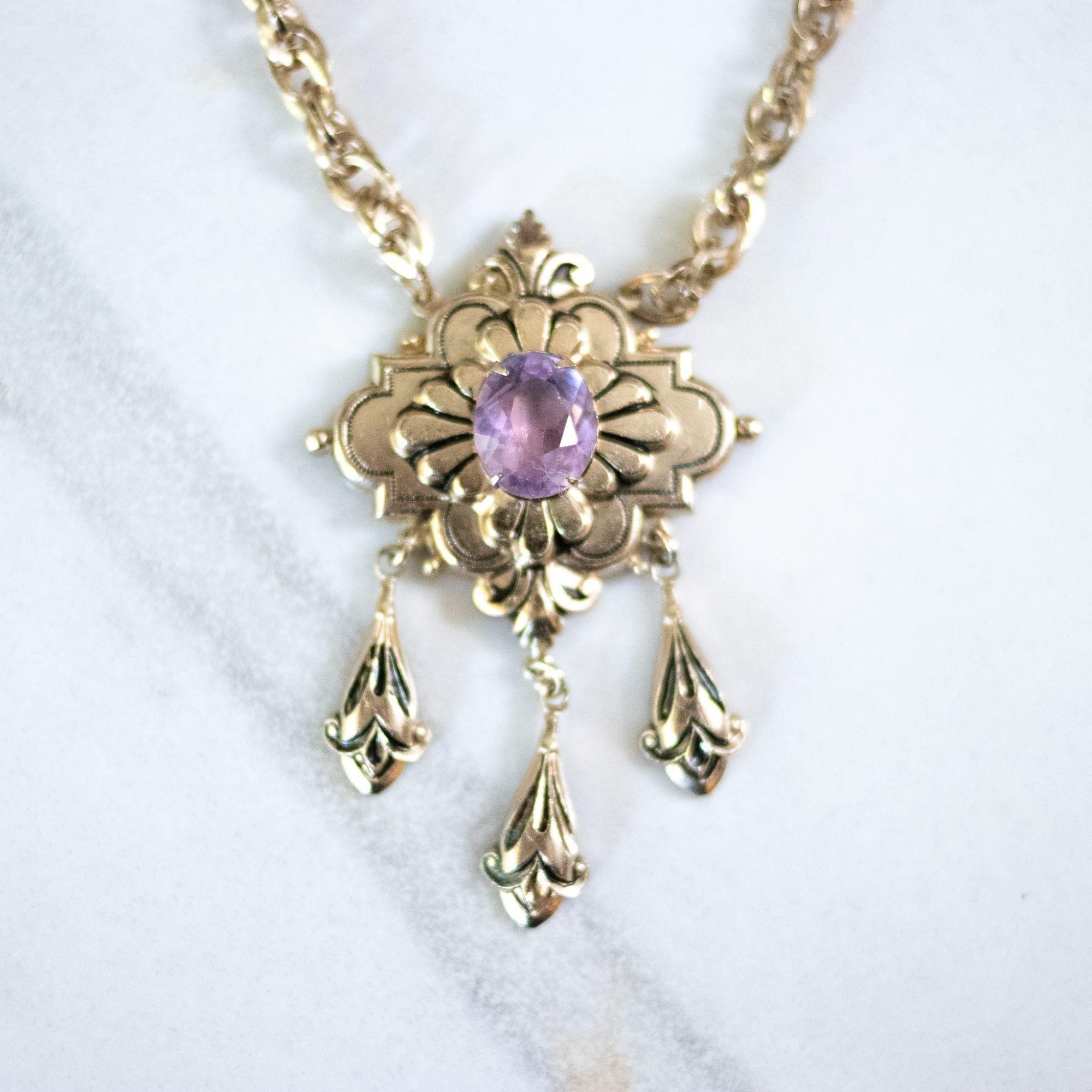 Vintage Coro Purple Crystal Gold Lavalier with Dangling Charms Necklace by Coro - Vintage Meet Modern Vintage Jewelry - Chicago, Illinois - #oldhollywoodglamour #vintagemeetmodern #designervintage #jewelrybox #antiquejewelry #vintagejewelry