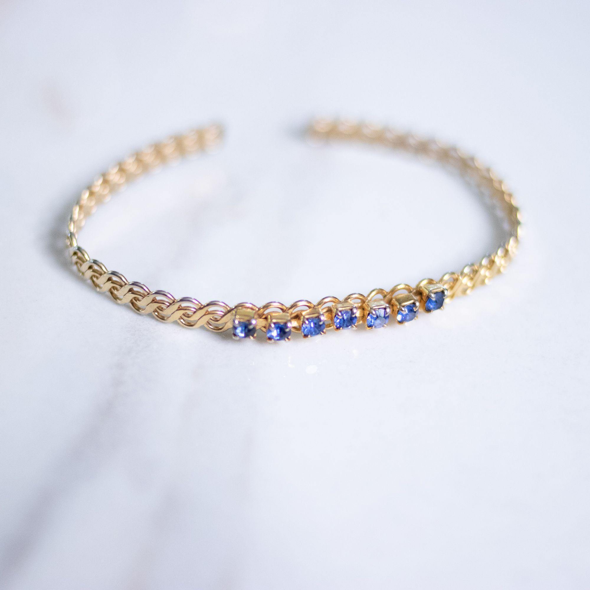 Vintage Petite Open Cuff Bracelet with Blue Rhinestones by Unsigned Beauty - Vintage Meet Modern Vintage Jewelry - Chicago, Illinois - #oldhollywoodglamour #vintagemeetmodern #designervintage #jewelrybox #antiquejewelry #vintagejewelry