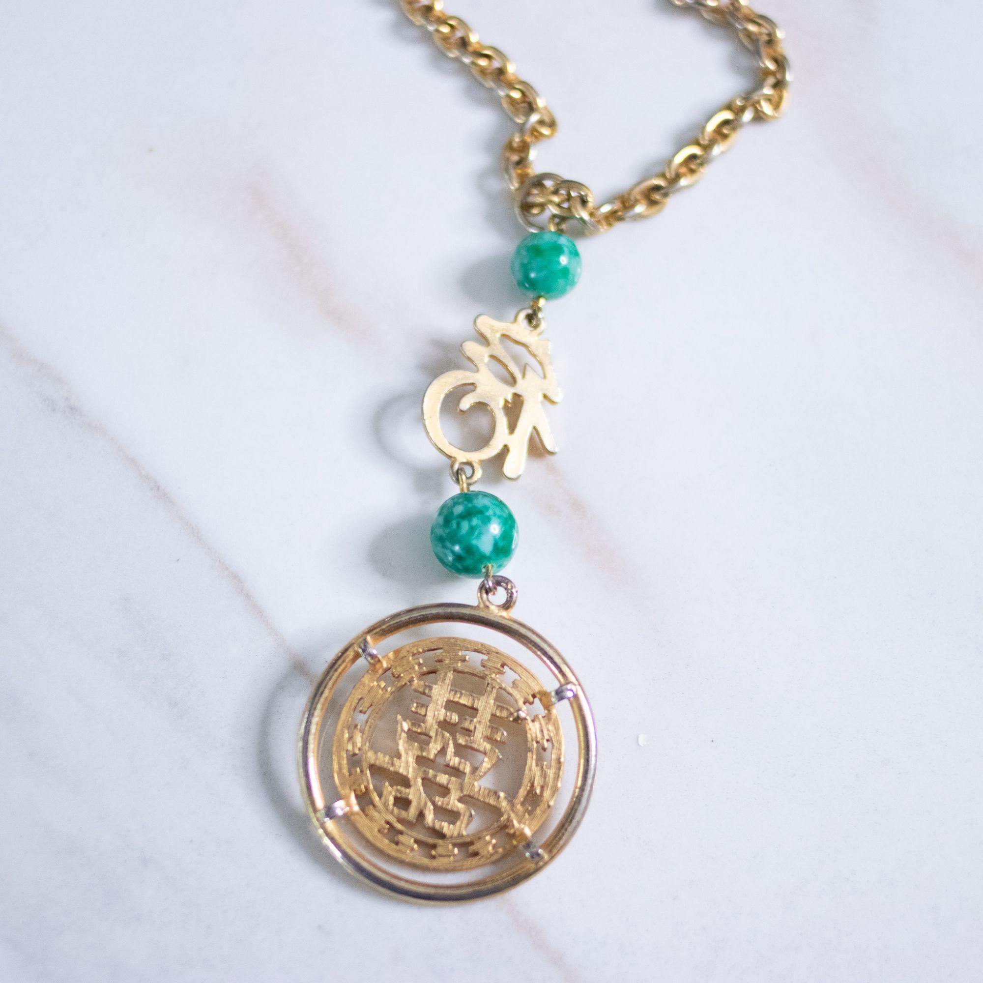 Vintage Asian Character Medallion Statement Necklace with Green Jade Lucite Beads by Unsigned Beauty - Vintage Meet Modern Vintage Jewelry - Chicago, Illinois - #oldhollywoodglamour #vintagemeetmodern #designervintage #jewelrybox #antiquejewelry #vintagejewelry