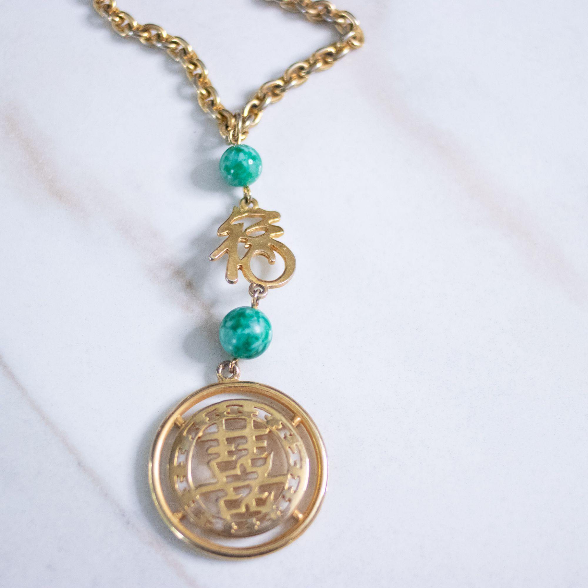 Vintage Asian Character Medallion Statement Necklace with Green Jade Lucite Beads by Unsigned Beauty - Vintage Meet Modern Vintage Jewelry - Chicago, Illinois - #oldhollywoodglamour #vintagemeetmodern #designervintage #jewelrybox #antiquejewelry #vintagejewelry