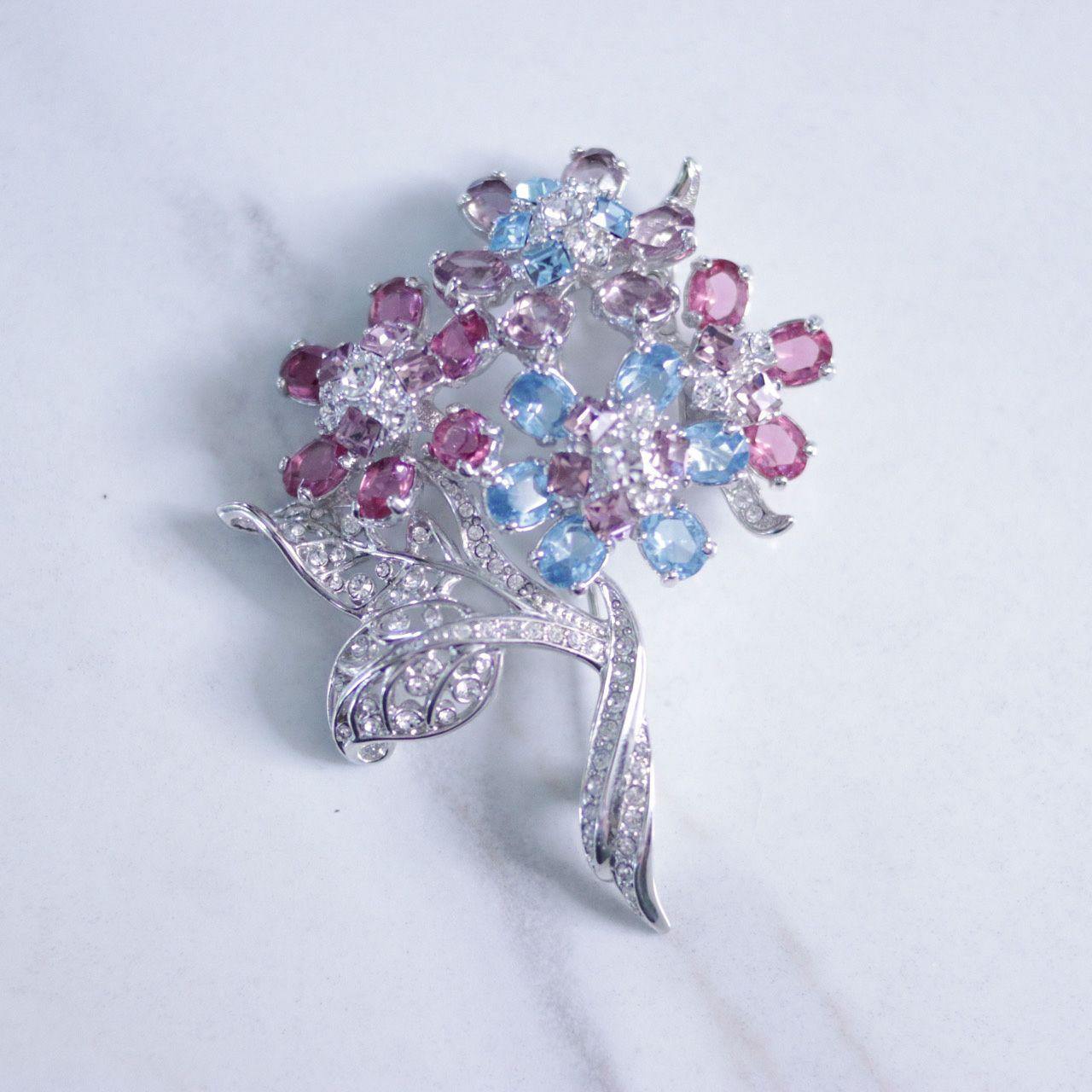 Vintage Nolan Miller Pink and Blue Rhinestone Large Flower Brooch by Nolan Miller - Vintage Meet Modern Vintage Jewelry - Chicago, Illinois - #oldhollywoodglamour #vintagemeetmodern #designervintage #jewelrybox #antiquejewelry #vintagejewelry