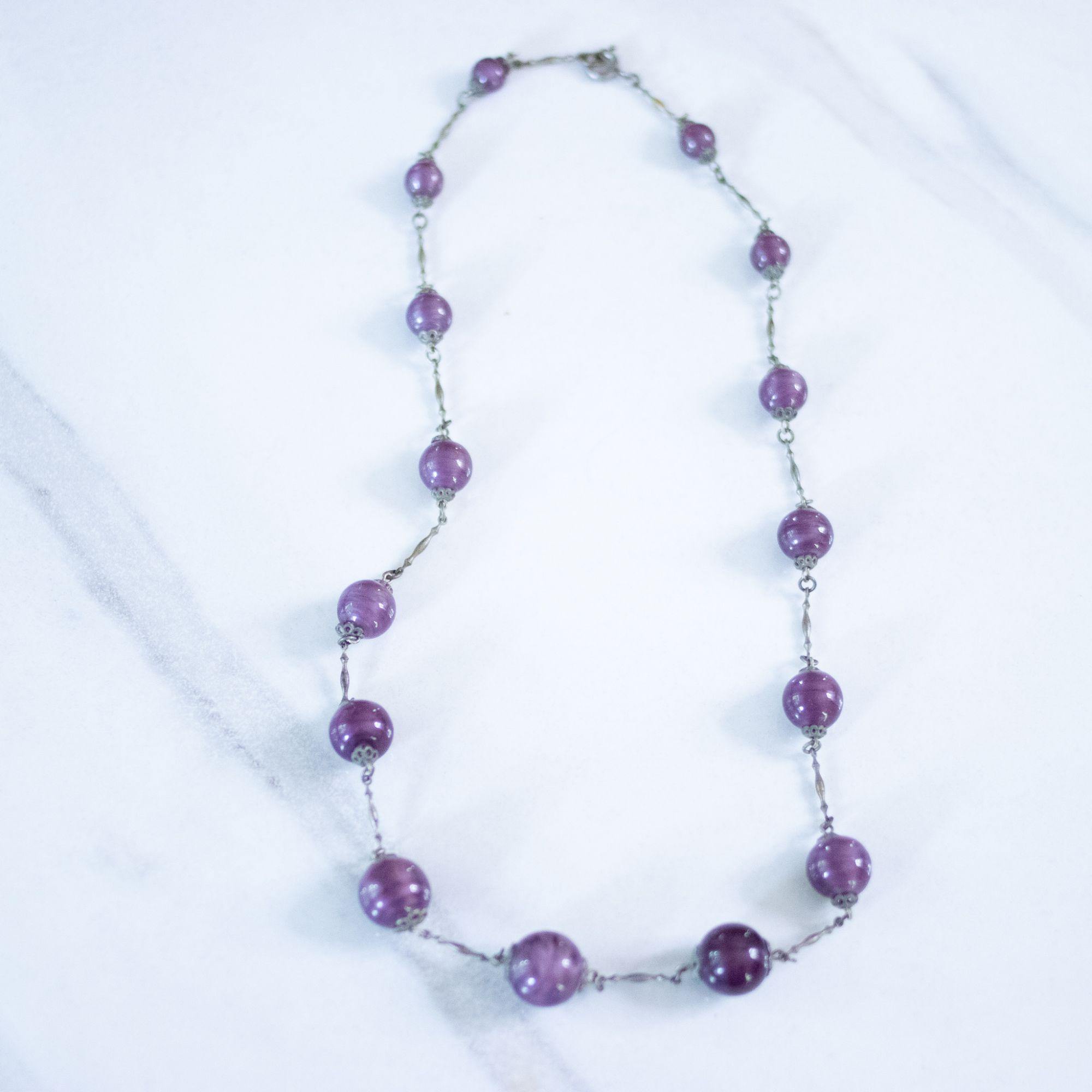 Vintage Art Deco Marbled Purple Bead Flapper Necklace by Czech - Vintage Meet Modern Vintage Jewelry - Chicago, Illinois - #oldhollywoodglamour #vintagemeetmodern #designervintage #jewelrybox #antiquejewelry #vintagejewelry