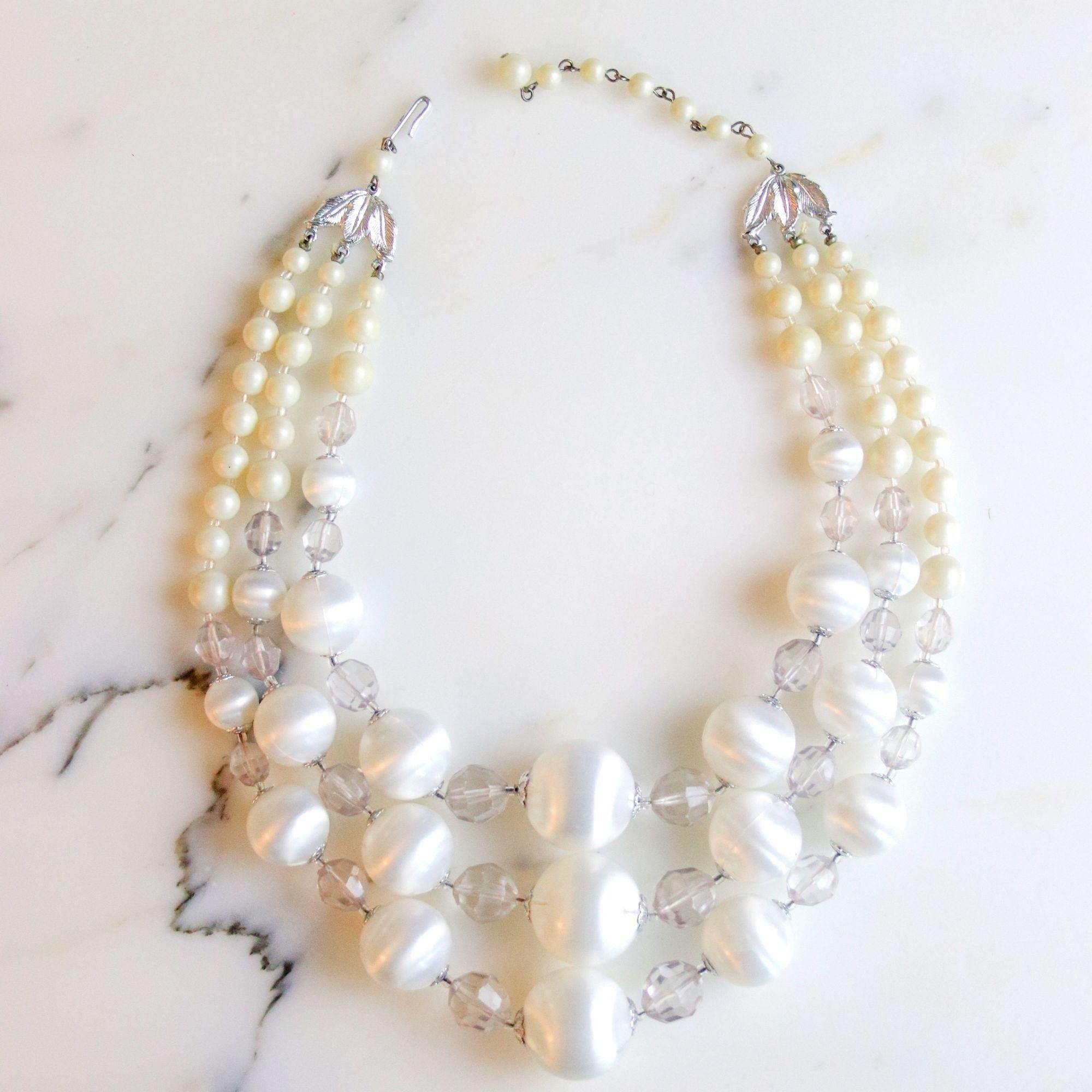 Vintage Pearl White Lucite Triple Strand Necklace by Vintage Meet Modern - Vintage Meet Modern Vintage Jewelry - Chicago, Illinois - #oldhollywoodglamour #vintagemeetmodern #designervintage #jewelrybox #antiquejewelry #vintagejewelry