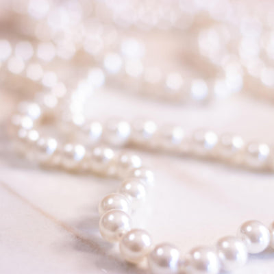 Vintage Hand-Knotted Glass Faux Pearl Necklace by Unsigned Beauty - Vintage Meet Modern Vintage Jewelry - Chicago, Illinois - #oldhollywoodglamour #vintagemeetmodern #designervintage #jewelrybox #antiquejewelry #vintagejewelry
