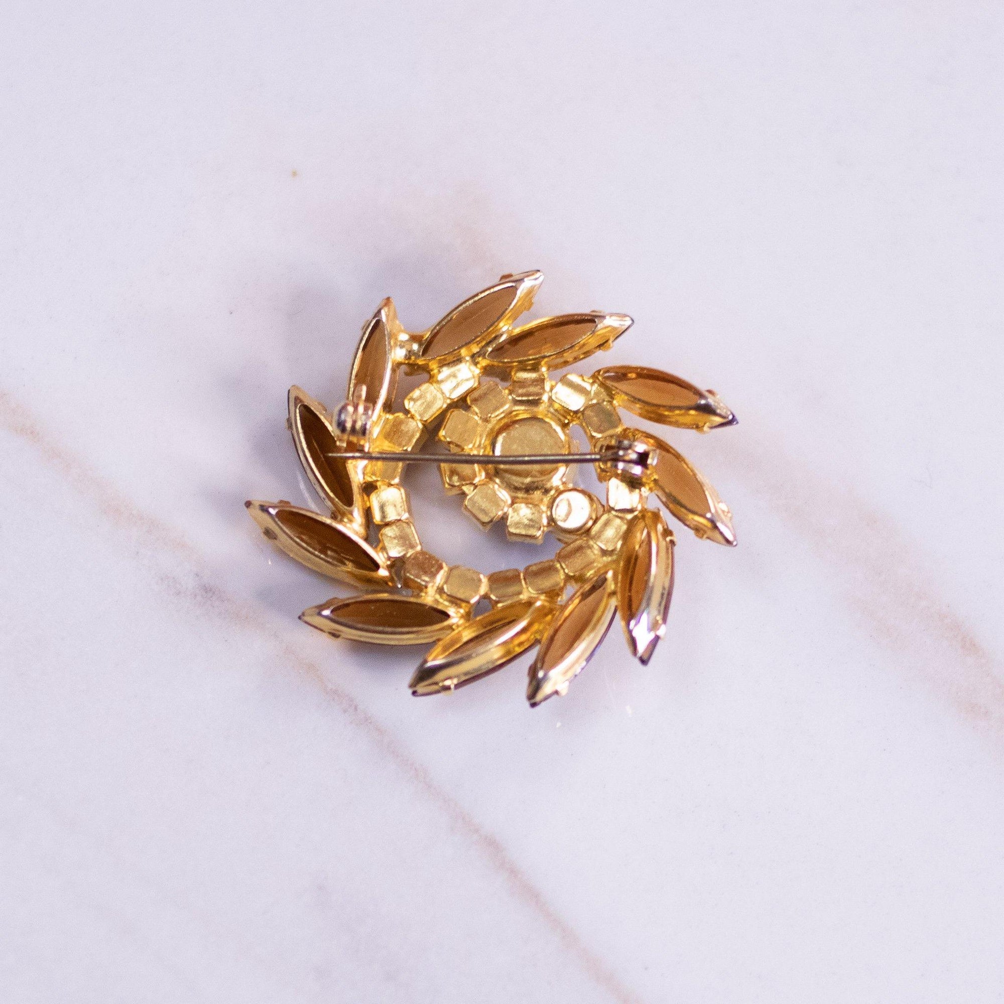 Vintage Amber Rhinestone Pinwheel Brooch by Unsigned Beauty - Vintage Meet Modern Vintage Jewelry - Chicago, Illinois - #oldhollywoodglamour #vintagemeetmodern #designervintage #jewelrybox #antiquejewelry #vintagejewelry