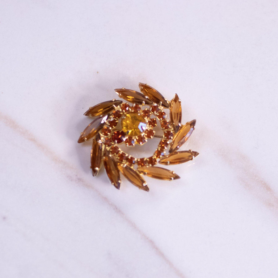 Vintage Amber Rhinestone Pinwheel Brooch by Unsigned Beauty - Vintage Meet Modern Vintage Jewelry - Chicago, Illinois - #oldhollywoodglamour #vintagemeetmodern #designervintage #jewelrybox #antiquejewelry #vintagejewelry