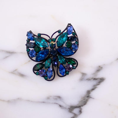Vintage Made in Austria Blue and Green Rhinestone Butterfly Brooch by Made in Austria - Vintage Meet Modern Vintage Jewelry - Chicago, Illinois - #oldhollywoodglamour #vintagemeetmodern #designervintage #jewelrybox #antiquejewelry #vintagejewelry