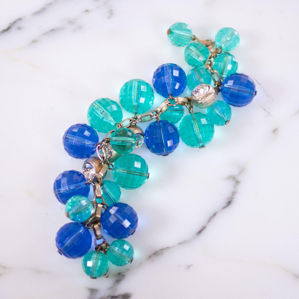 Vintage Faceted Blue and Green Faceted Lucite and Gold Rhinestone Charm Bracelet