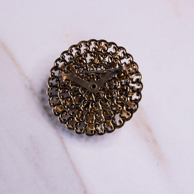 Vintage Medallion Brooch with Pink, Blue, and Green Rhinestones by Unsigned Beauty - Vintage Meet Modern Vintage Jewelry - Chicago, Illinois - #oldhollywoodglamour #vintagemeetmodern #designervintage #jewelrybox #antiquejewelry #vintagejewelry