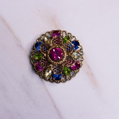 Vintage Medallion Brooch with Pink, Blue, and Green Rhinestones by Unsigned Beauty - Vintage Meet Modern Vintage Jewelry - Chicago, Illinois - #oldhollywoodglamour #vintagemeetmodern #designervintage #jewelrybox #antiquejewelry #vintagejewelry