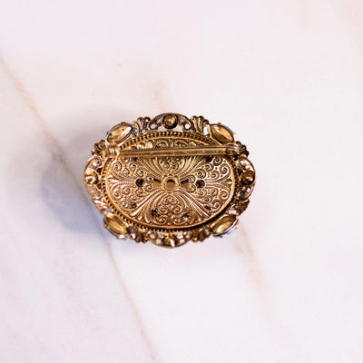 Vintage West Germany Gold Filigree Brooch with Blue Crystal and Faux Pearls by West Germany - Vintage Meet Modern Vintage Jewelry - Chicago, Illinois - #oldhollywoodglamour #vintagemeetmodern #designervintage #jewelrybox #antiquejewelry #vintagejewelry