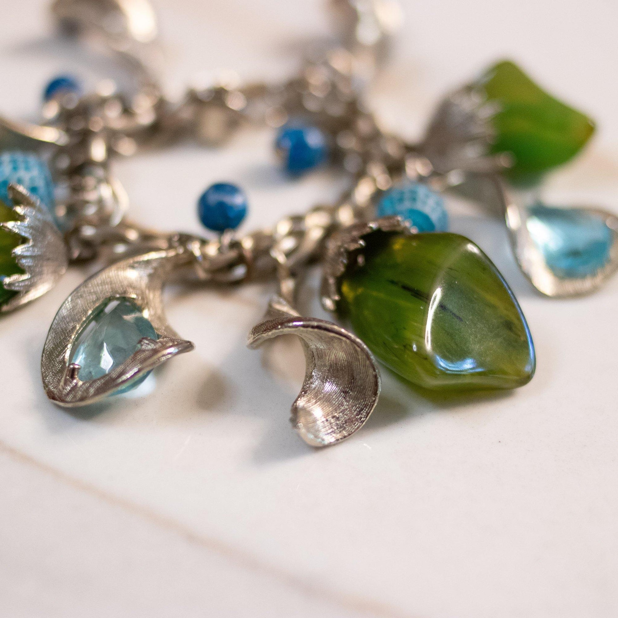 Vintage 1950s Mid Century Modern Blue and Green Lucite Charm Bracelet by Unsigned Beauty - Vintage Meet Modern Vintage Jewelry - Chicago, Illinois - #oldhollywoodglamour #vintagemeetmodern #designervintage #jewelrybox #antiquejewelry #vintagejewelry