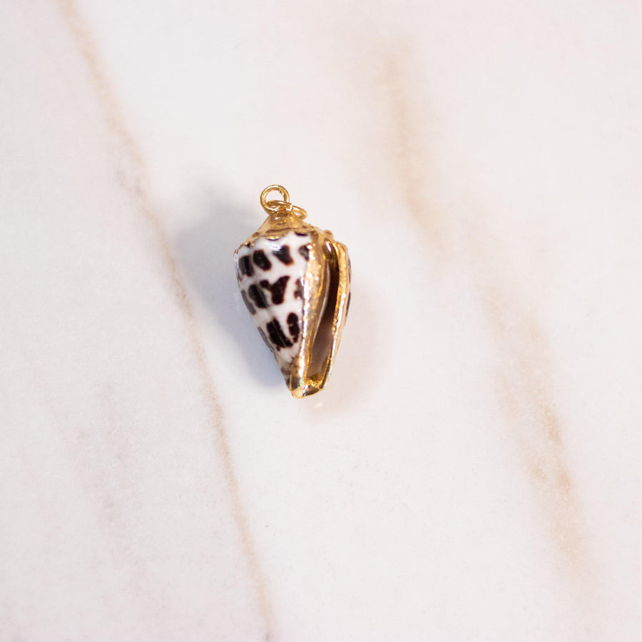Vintage Brown and White Spotted Cowrie Shell Pendant with 18kt Gold Accents by Unsigned Beauty - Vintage Meet Modern Vintage Jewelry - Chicago, Illinois - #oldhollywoodglamour #vintagemeetmodern #designervintage #jewelrybox #antiquejewelry #vintagejewelry