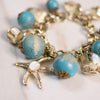 Vintage Chunky Blue Bead, Sea Inspired Charm Bracelet by Unsigned Beauty - Vintage Meet Modern Vintage Jewelry - Chicago, Illinois - #oldhollywoodglamour #vintagemeetmodern #designervintage #jewelrybox #antiquejewelry #vintagejewelry