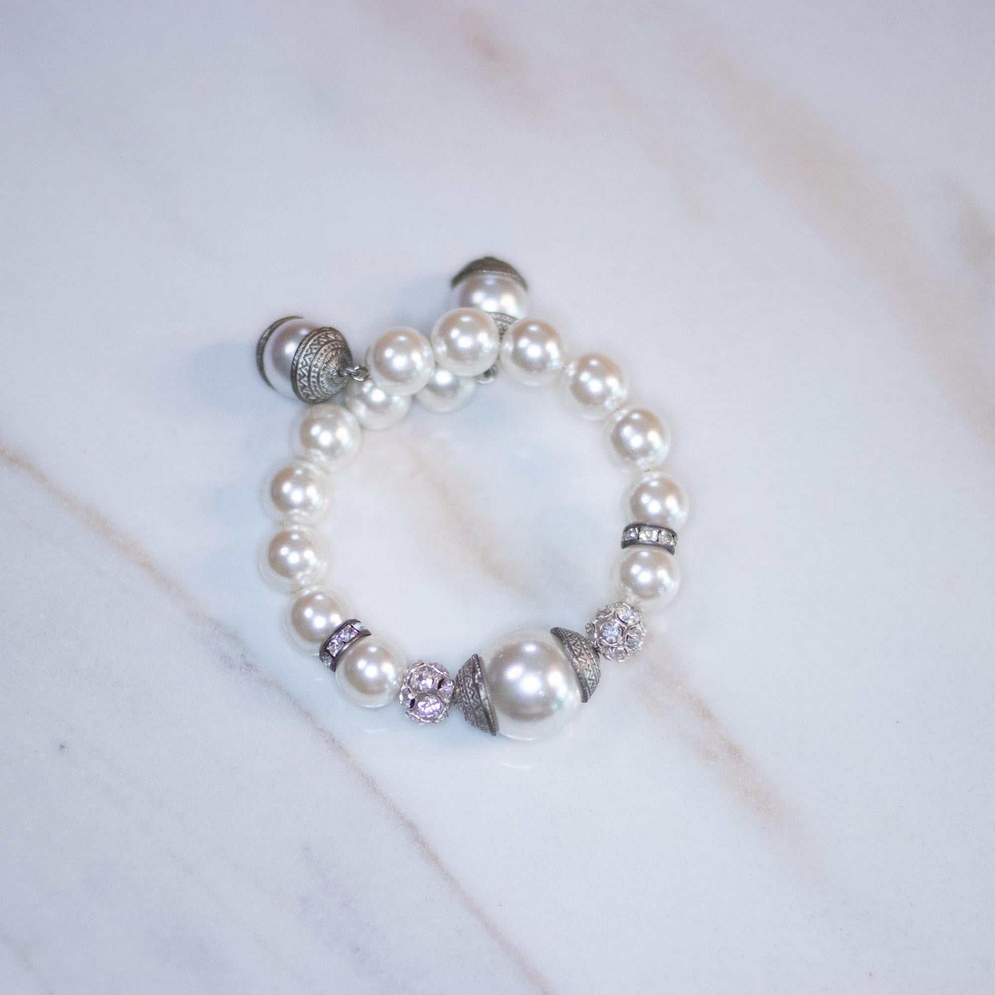 Vintage Faux Pearl and Rhinestone Coil Bracelet by Unsigned Beauty - Vintage Meet Modern Vintage Jewelry - Chicago, Illinois - #oldhollywoodglamour #vintagemeetmodern #designervintage #jewelrybox #antiquejewelry #vintagejewelry