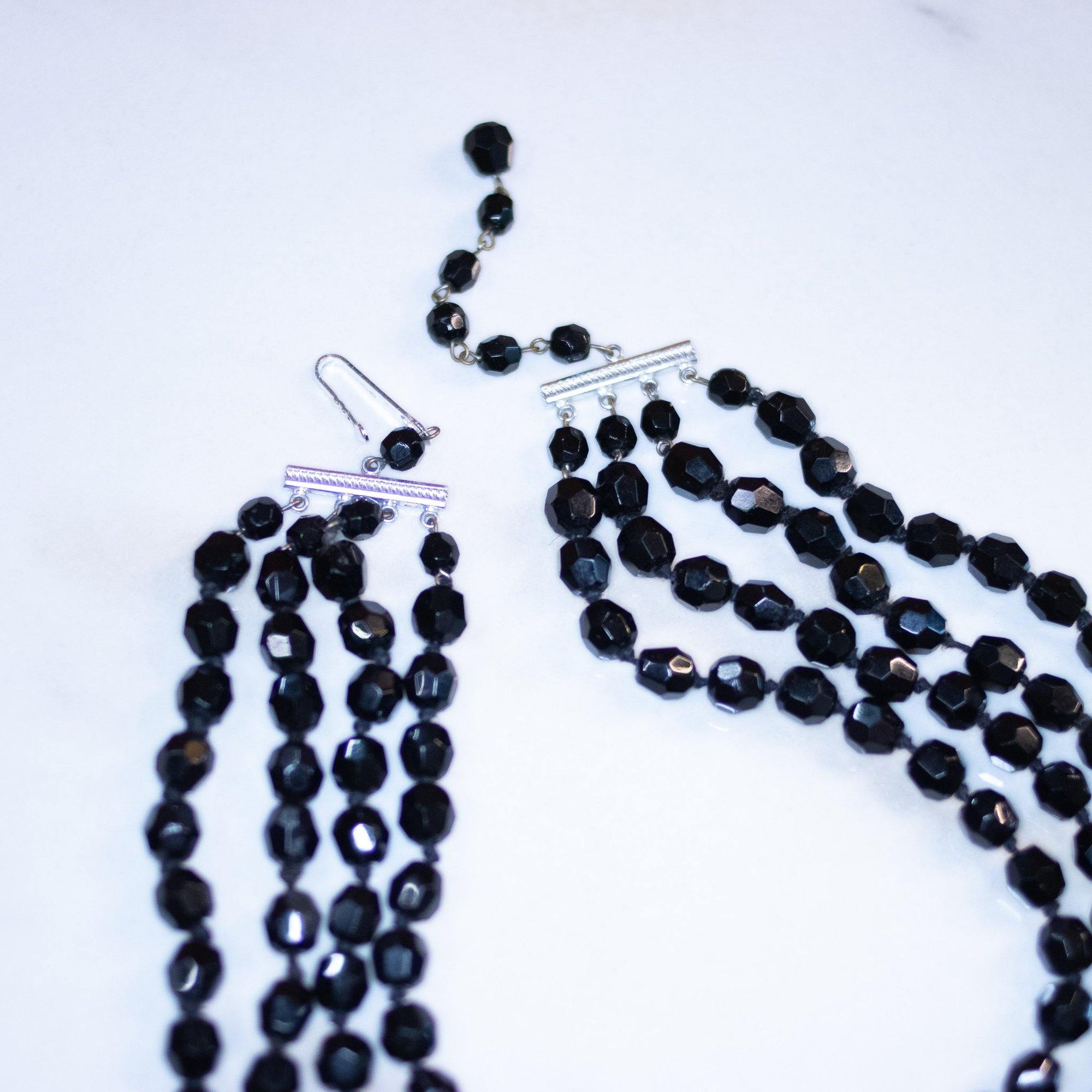 Vintage Four Strand Jet Bead Necklace by Germany - Vintage Meet Modern Vintage Jewelry - Chicago, Illinois - #oldhollywoodglamour #vintagemeetmodern #designervintage #jewelrybox #antiquejewelry #vintagejewelry