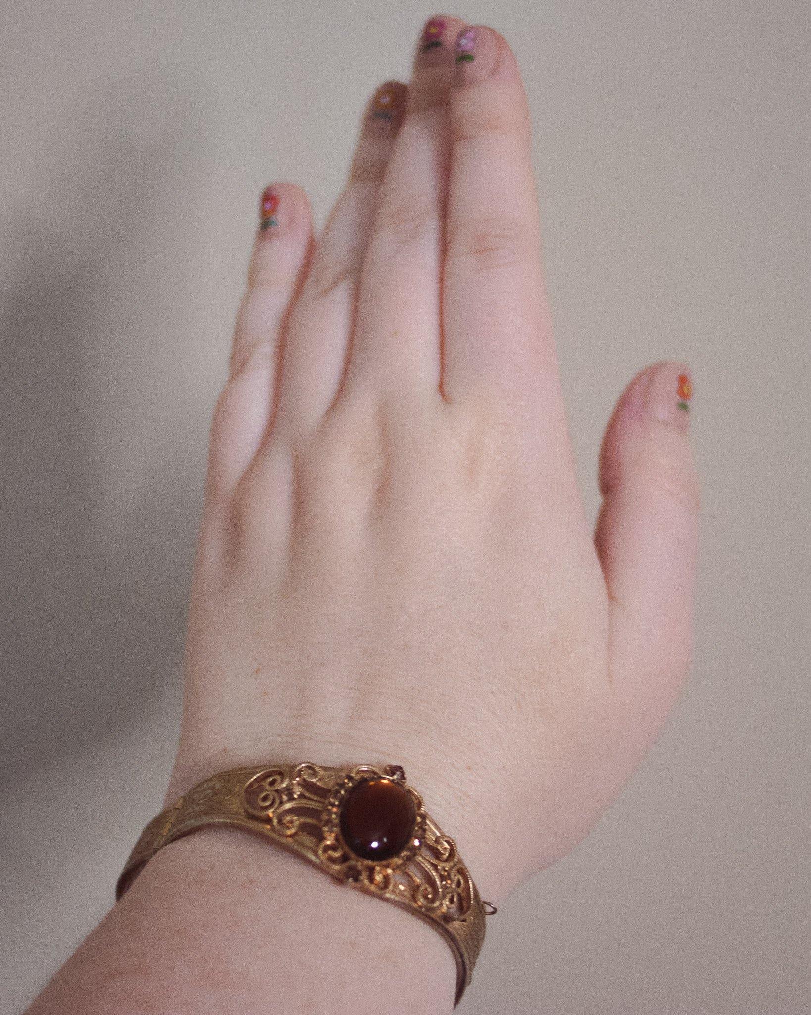 Vintage Czech Gold Embossed Bangle Bracelet with Amber Glass Cabochon by Czech - Vintage Meet Modern Vintage Jewelry - Chicago, Illinois - #oldhollywoodglamour #vintagemeetmodern #designervintage #jewelrybox #antiquejewelry #vintagejewelry