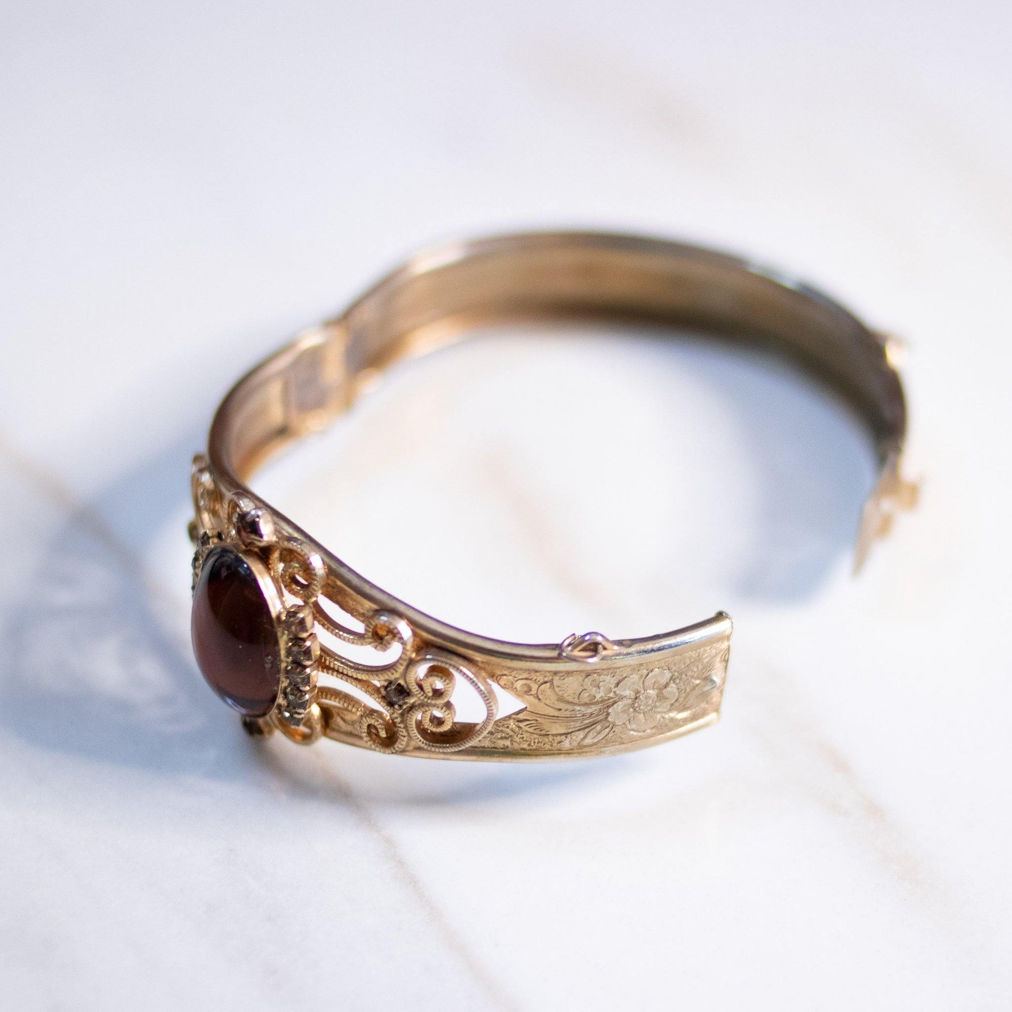 Vintage Czech Gold Embossed Bangle Bracelet with Amber Glass Cabochon by Czech - Vintage Meet Modern Vintage Jewelry - Chicago, Illinois - #oldhollywoodglamour #vintagemeetmodern #designervintage #jewelrybox #antiquejewelry #vintagejewelry