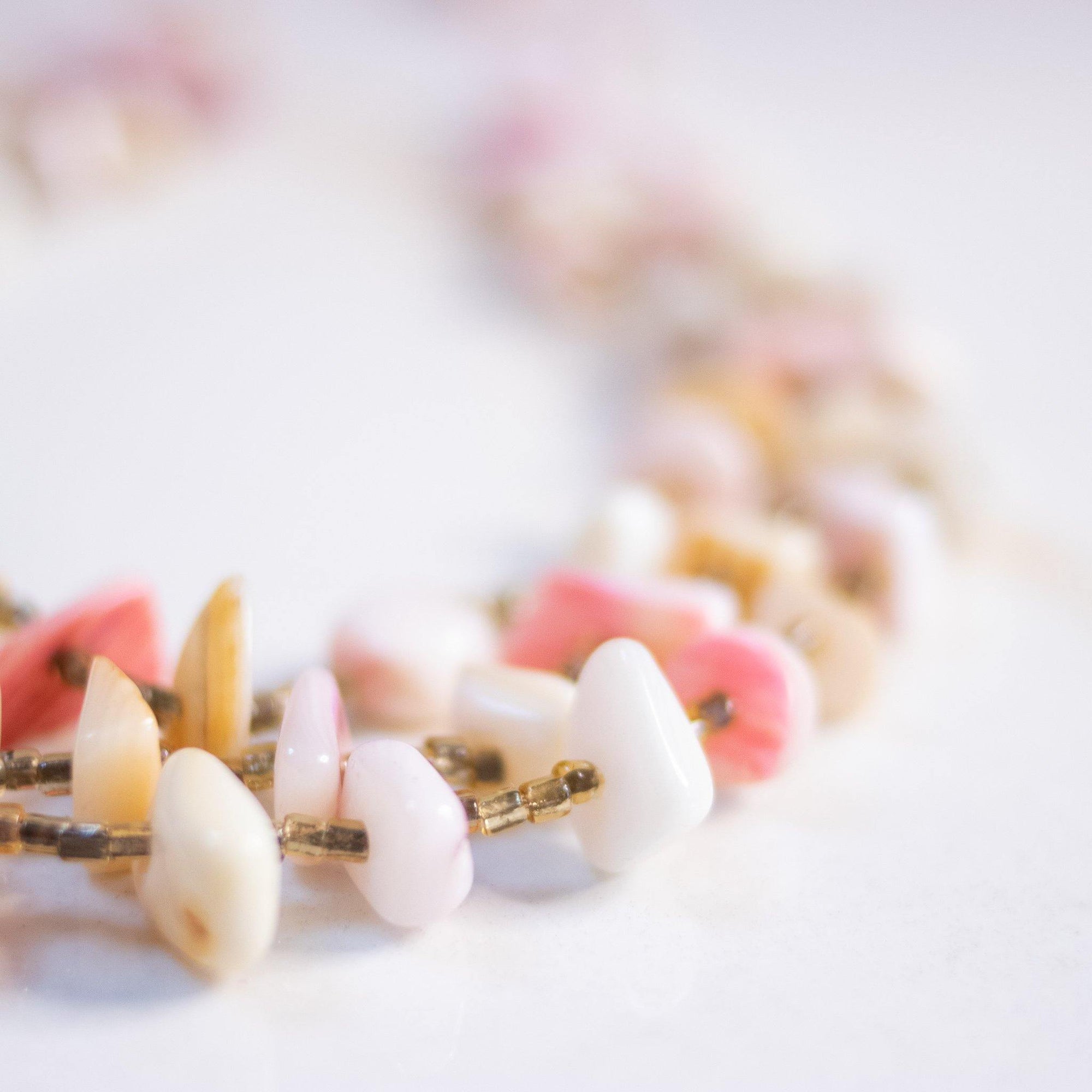 Vintage Pink and White Mother of Pearl Triple Strand Necklace by Made in Japan - Vintage Meet Modern Vintage Jewelry - Chicago, Illinois - #oldhollywoodglamour #vintagemeetmodern #designervintage #jewelrybox #antiquejewelry #vintagejewelry
