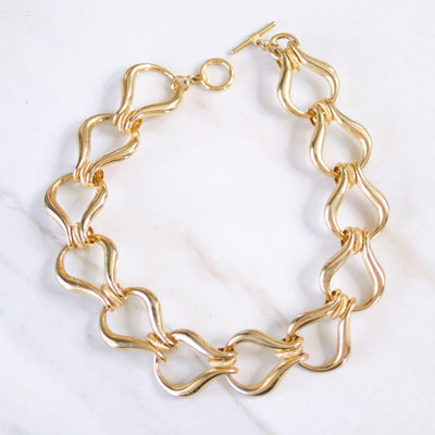 Vintage 1980s Chunky Gold Stirrup Link Necklace by Unsigned Beauty - Vintage Meet Modern Vintage Jewelry - Chicago, Illinois - #oldhollywoodglamour #vintagemeetmodern #designervintage #jewelrybox #antiquejewelry #vintagejewelry