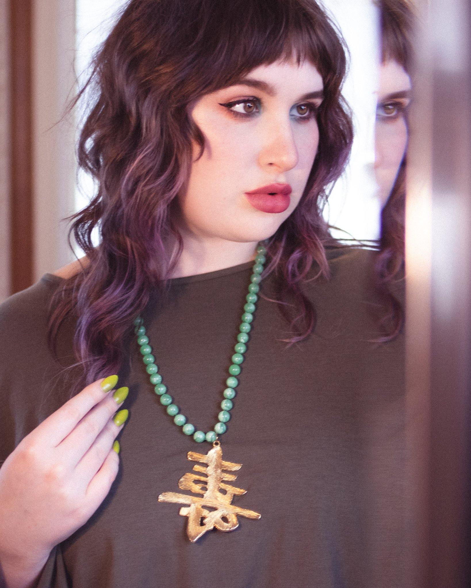 Vintage Lisner Huge Asian Character and Faux Jade Bead Statement Necklace by Lisner - Vintage Meet Modern Vintage Jewelry - Chicago, Illinois - #oldhollywoodglamour #vintagemeetmodern #designervintage #jewelrybox #antiquejewelry #vintagejewelry