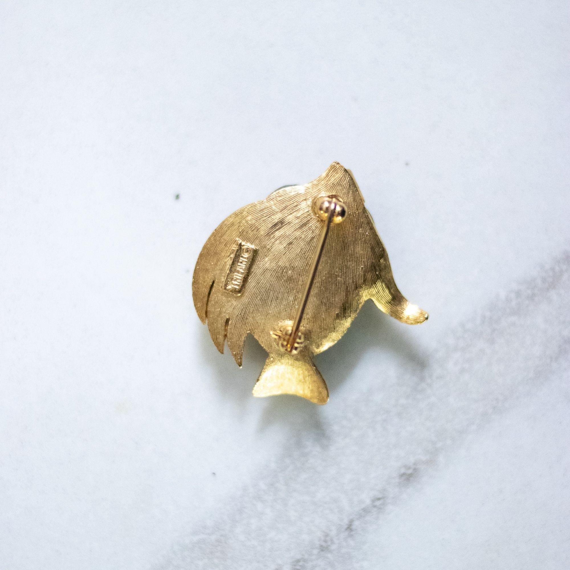 Vintage Crown Trifari Green Glass and Gold Tone Fish Brooch by Crown Trifari - Vintage Meet Modern Vintage Jewelry - Chicago, Illinois - #oldhollywoodglamour #vintagemeetmodern #designervintage #jewelrybox #antiquejewelry #vintagejewelry