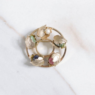 Vintage Sarah Coventry Floral Brooch with Lapis, Rose Quartz, Pearl, and Jade by Sarah Coventry - Vintage Meet Modern Vintage Jewelry - Chicago, Illinois - #oldhollywoodglamour #vintagemeetmodern #designervintage #jewelrybox #antiquejewelry #vintagejewelry