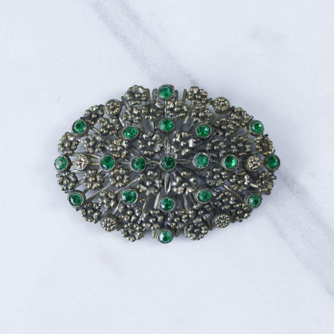 Vintage Large Green Brass Pot Metal Brooch with Embossed Floral Design and Green Rhinestone Accents by Unsigned Beauty - Vintage Meet Modern Vintage Jewelry - Chicago, Illinois - #oldhollywoodglamour #vintagemeetmodern #designervintage #jewelrybox #antiquejewelry #vintagejewelry