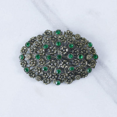 Vintage Large Green Brass Pot Metal Brooch with Embossed Floral Design and Green Rhinestone Accents by Unsigned Beauty - Vintage Meet Modern Vintage Jewelry - Chicago, Illinois - #oldhollywoodglamour #vintagemeetmodern #designervintage #jewelrybox #antiquejewelry #vintagejewelry