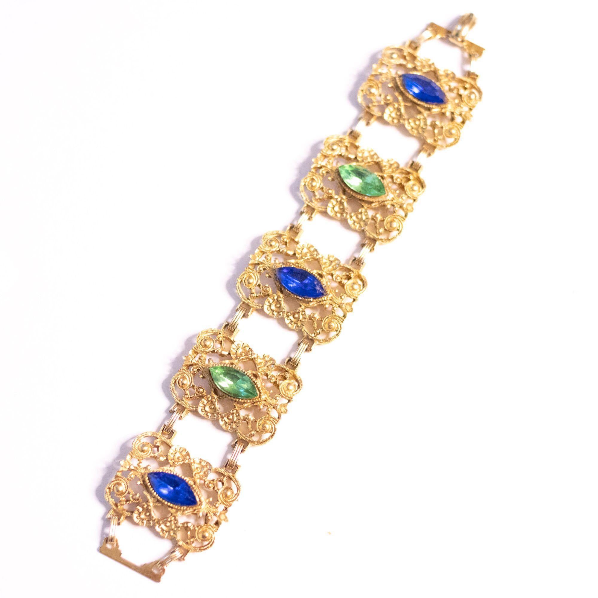 Vintage Ornate Wide Gold Panel Bracelet with Blue and Green Rhinestones by Unsigned Beauty - Vintage Meet Modern Vintage Jewelry - Chicago, Illinois - #oldhollywoodglamour #vintagemeetmodern #designervintage #jewelrybox #antiquejewelry #vintagejewelry