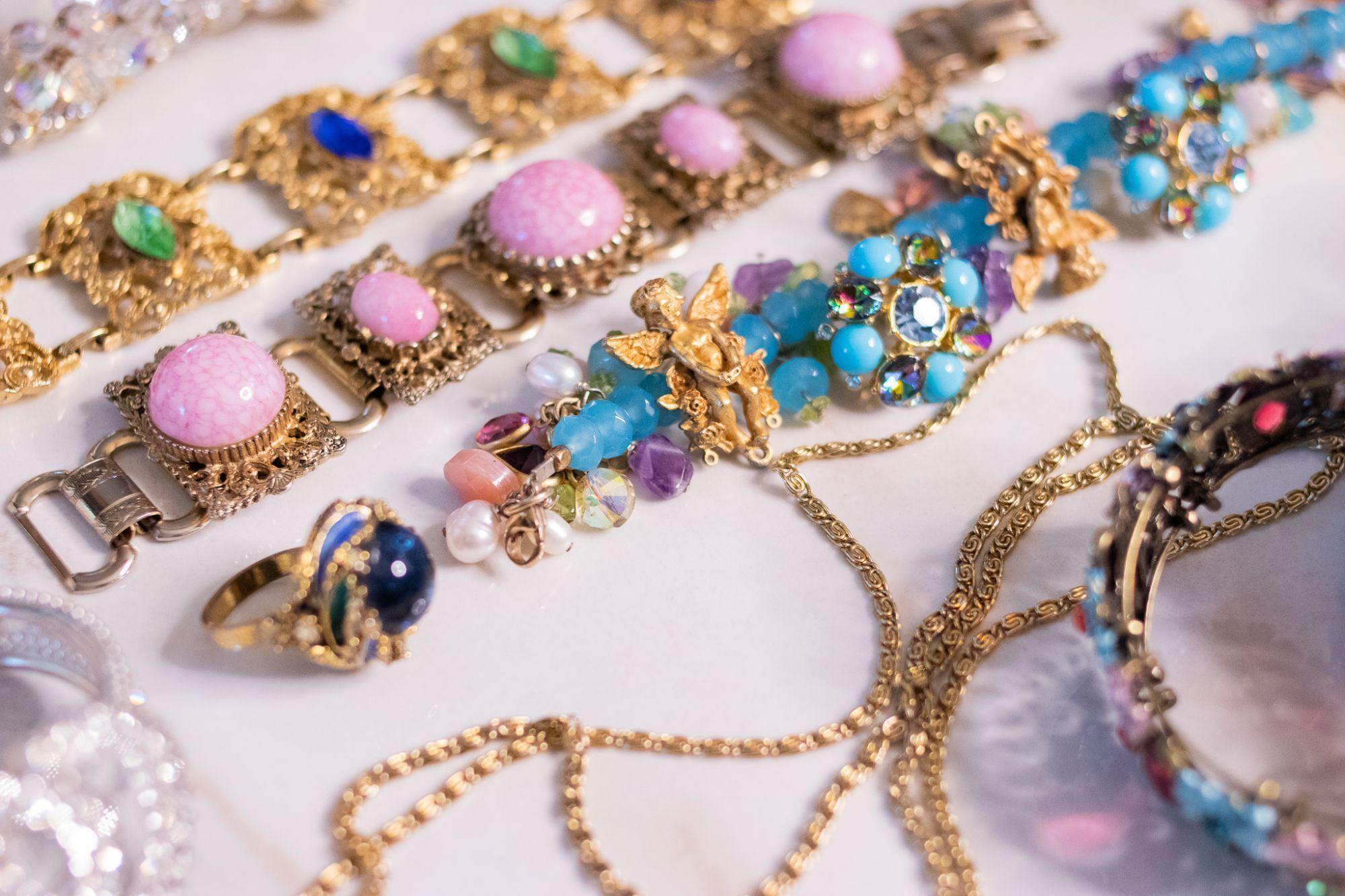 Vintage Ornate Wide Gold Panel Bracelet with Blue and Green Rhinestones by Unsigned Beauty - Vintage Meet Modern Vintage Jewelry - Chicago, Illinois - #oldhollywoodglamour #vintagemeetmodern #designervintage #jewelrybox #antiquejewelry #vintagejewelry