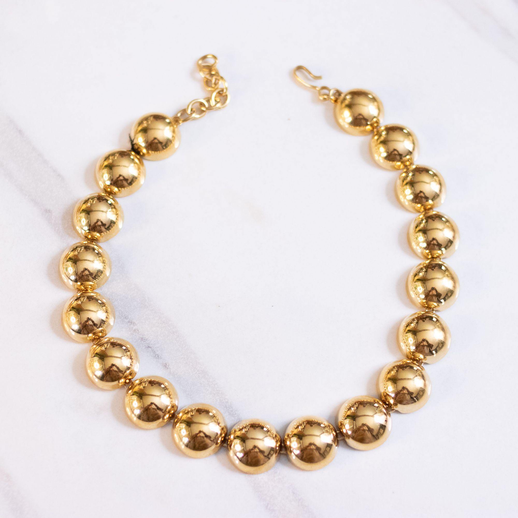 Vintage Monet  Flat Bead Chunky Gold Bracelet by Monet - Vintage Meet Modern Vintage Jewelry - Chicago, Illinois - #oldhollywoodglamour #vintagemeetmodern #designervintage #jewelrybox #antiquejewelry #vintagejewelry