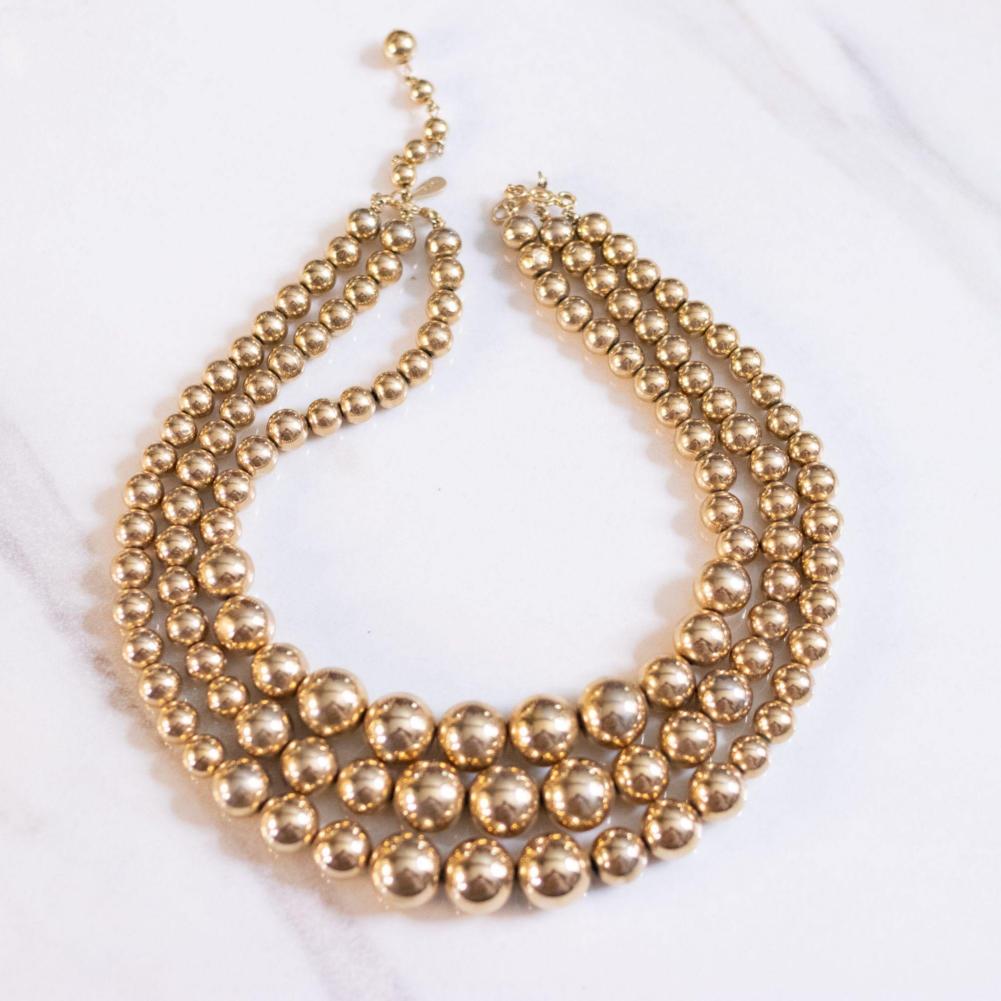 Vintage Marvella Triple Strand Gold Bead Necklace by Marvella - Vintage Meet Modern Vintage Jewelry - Chicago, Illinois - #oldhollywoodglamour #vintagemeetmodern #designervintage #jewelrybox #antiquejewelry #vintagejewelry