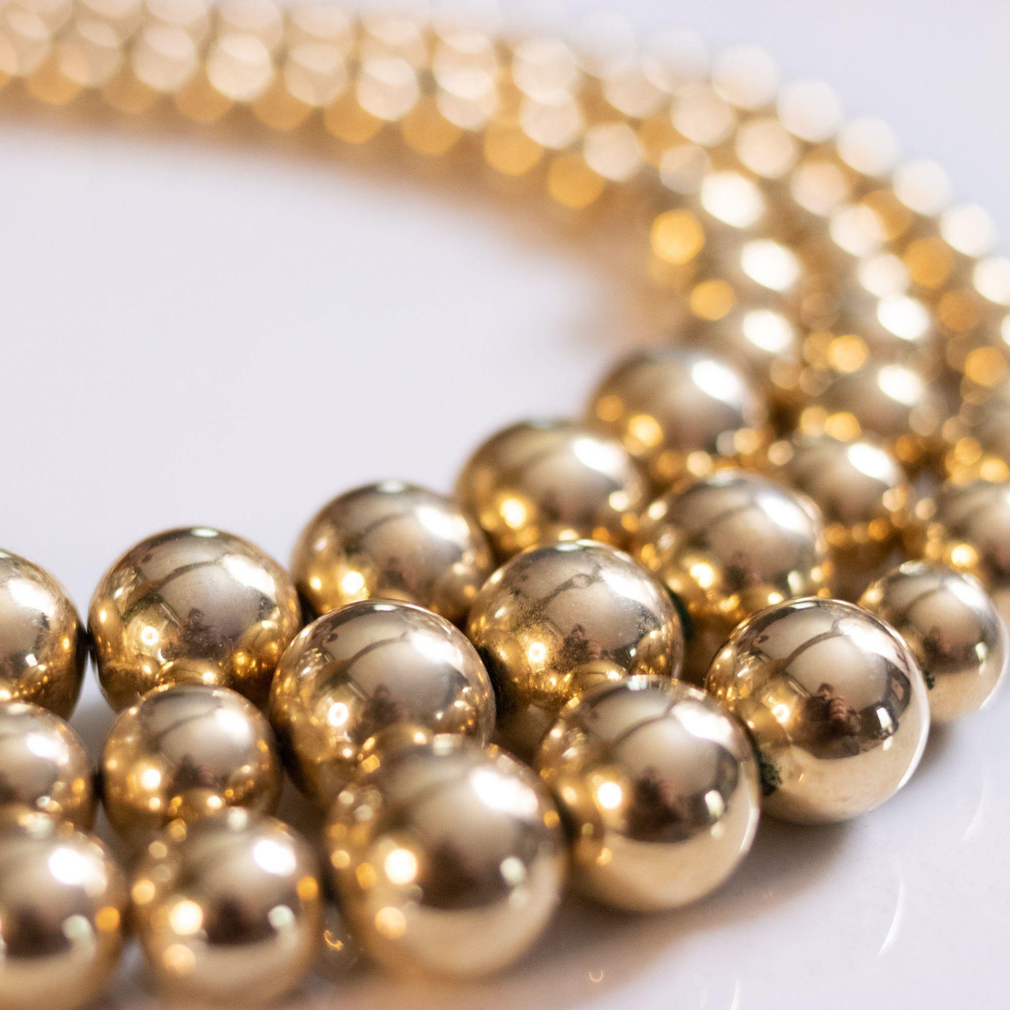 Vintage Marvella Triple Strand Gold Bead Necklace by Marvella - Vintage Meet Modern Vintage Jewelry - Chicago, Illinois - #oldhollywoodglamour #vintagemeetmodern #designervintage #jewelrybox #antiquejewelry #vintagejewelry