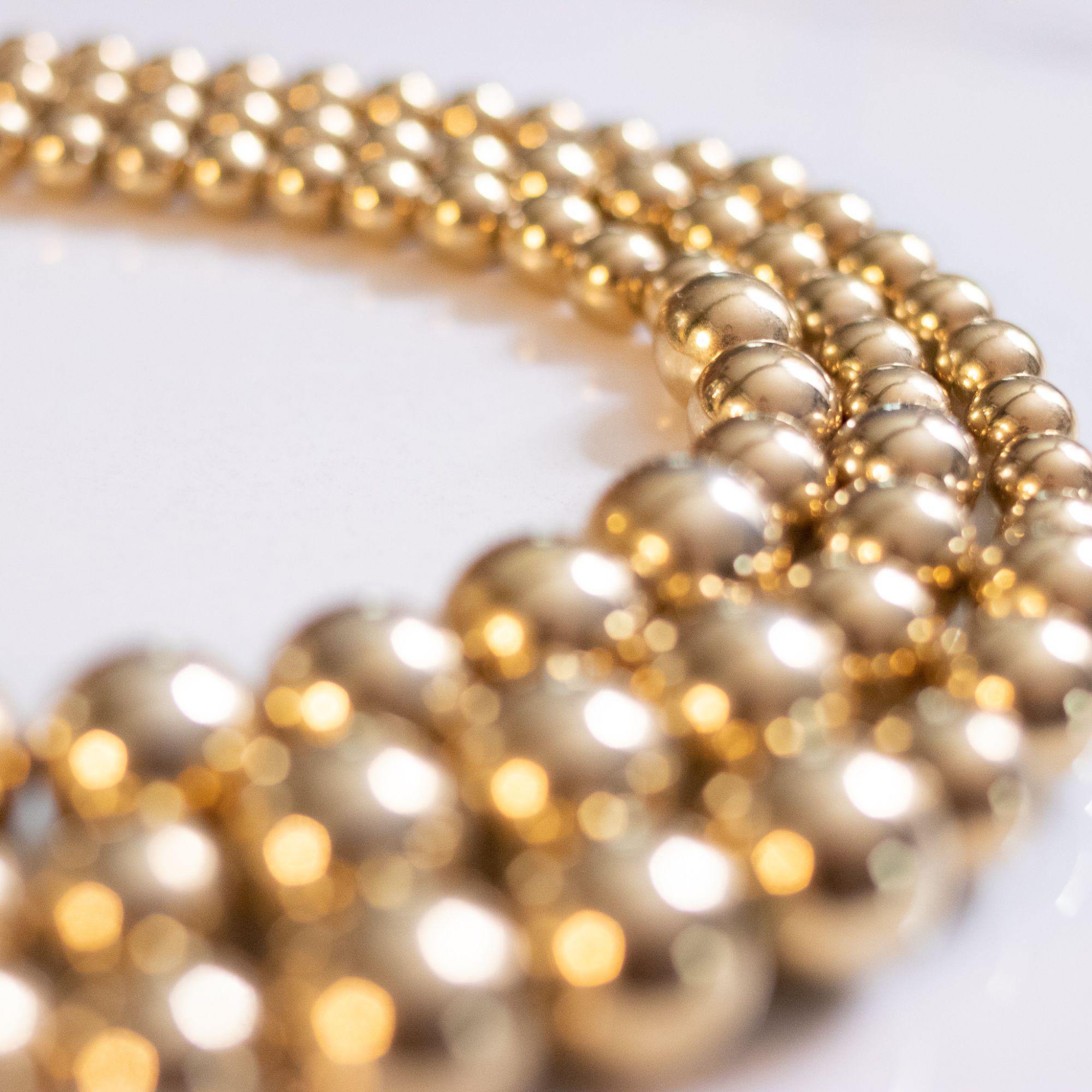 Vintage Marvella Triple Strand Gold Bead Necklace by Marvella - Vintage Meet Modern Vintage Jewelry - Chicago, Illinois - #oldhollywoodglamour #vintagemeetmodern #designervintage #jewelrybox #antiquejewelry #vintagejewelry