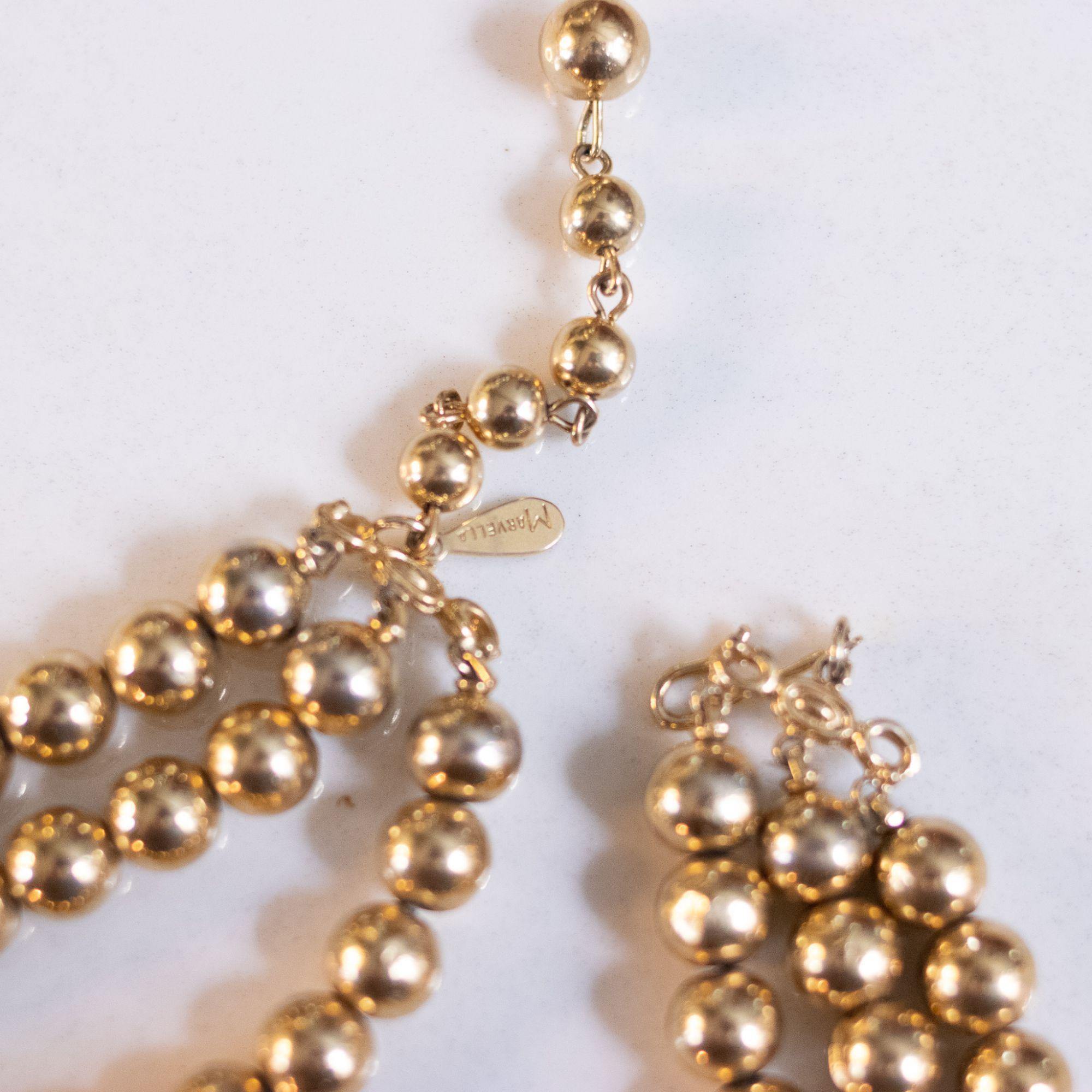 Vintage Marvella Triple Strand Gold Bead Necklace by Marvella - Vintage Meet Modern Vintage Jewelry - Chicago, Illinois - #oldhollywoodglamour #vintagemeetmodern #designervintage #jewelrybox #antiquejewelry #vintagejewelry