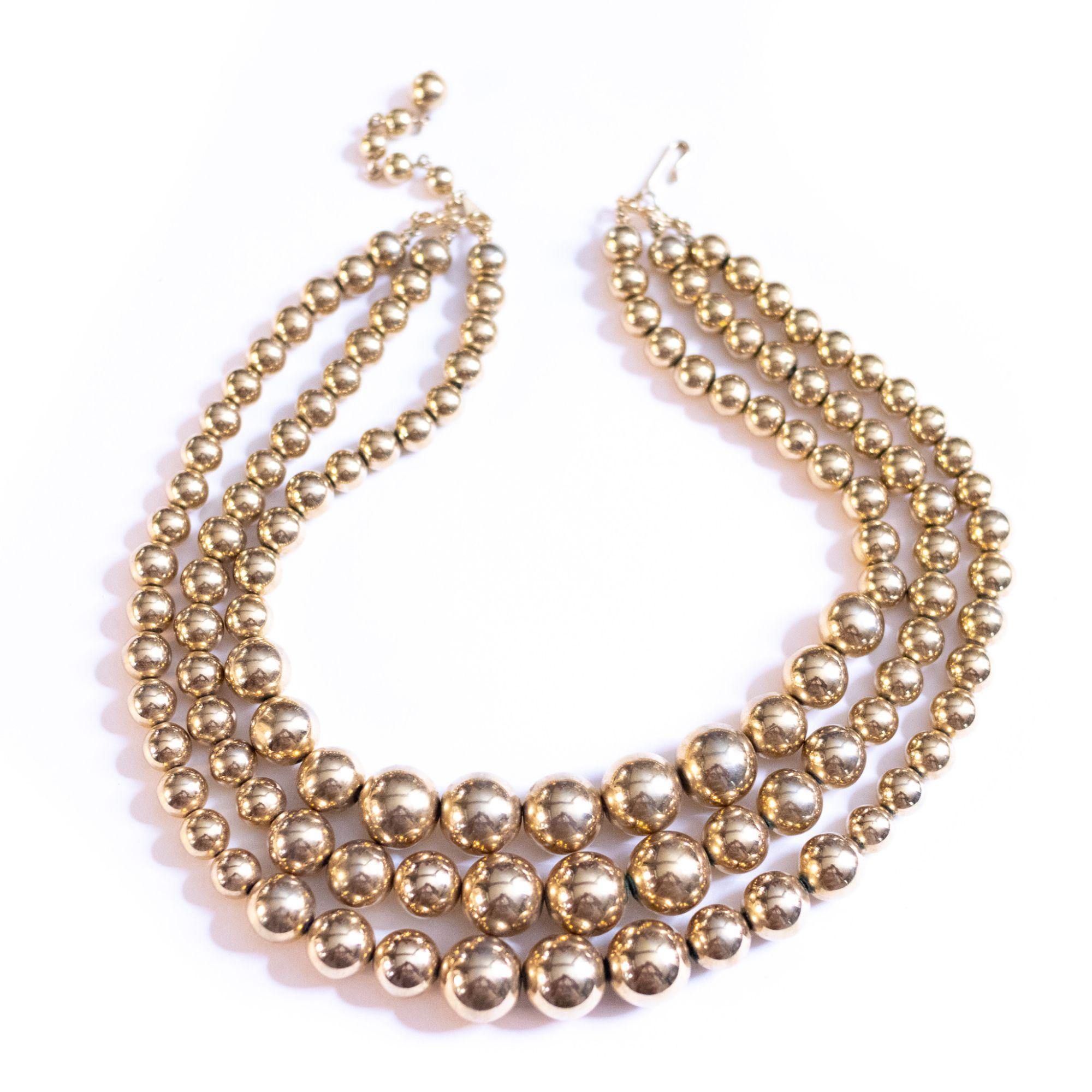 Vintage Marvella Triple Strand Gold Bead Necklace by Marvella - Vintage Meet Modern Vintage Jewelry - Chicago, Illinois - #oldhollywoodglamour #vintagemeetmodern #designervintage #jewelrybox #antiquejewelry #vintagejewelry