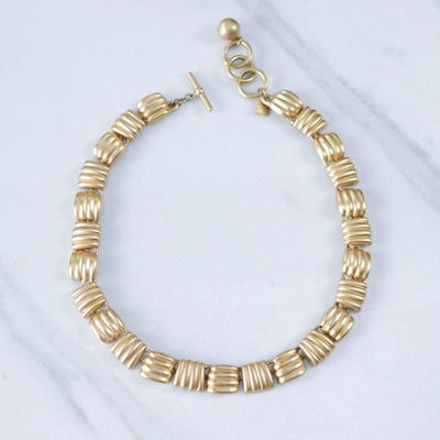 Vintage Anne Klein Couture Brushed Gold Tone Basketweave Square Link Necklace by Anne Klein Couture - Vintage Meet Modern Vintage Jewelry - Chicago, Illinois - #oldhollywoodglamour #vintagemeetmodern #designervintage #jewelrybox #antiquejewelry #vintagejewelry