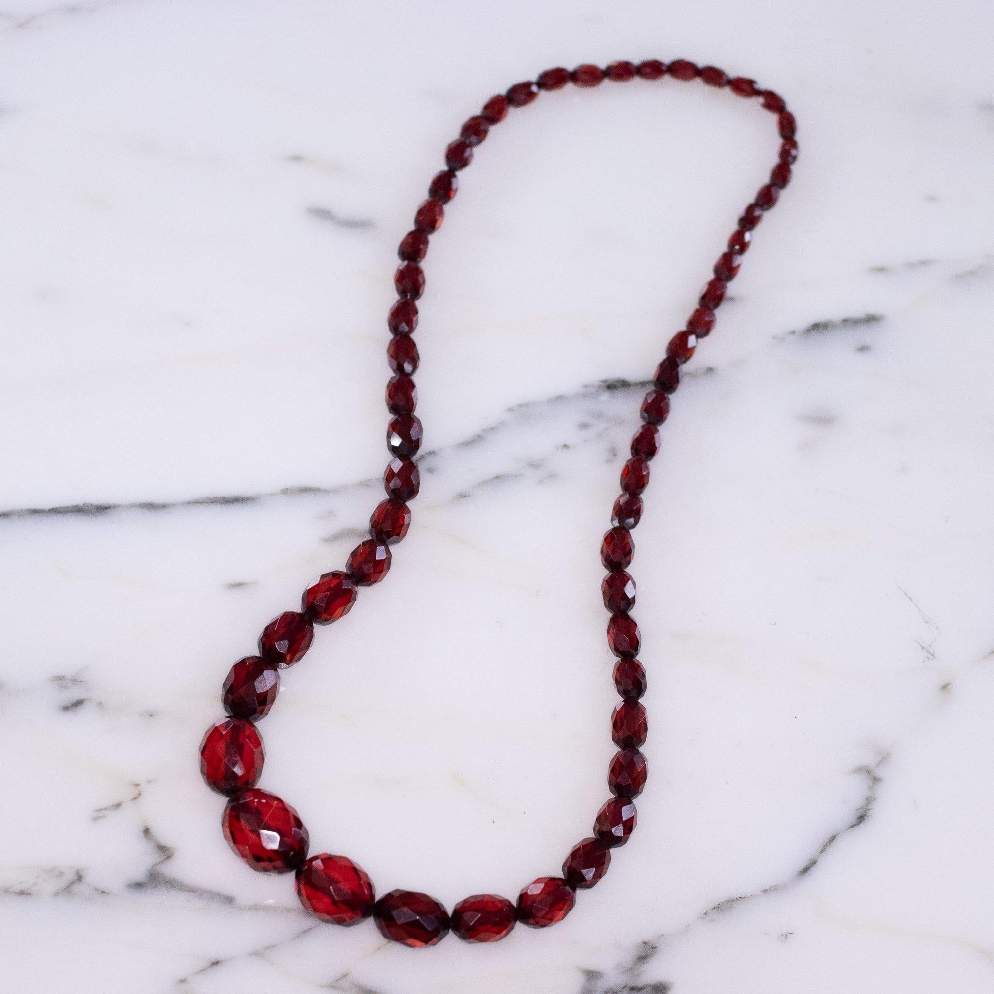 Vintage Cherry Juice Amber Bakelite Bead Necklace by Unsigned - Vintage Meet Modern Vintage Jewelry - Chicago, Illinois - #oldhollywoodglamour #vintagemeetmodern #designervintage #jewelrybox #antiquejewelry #vintagejewelry