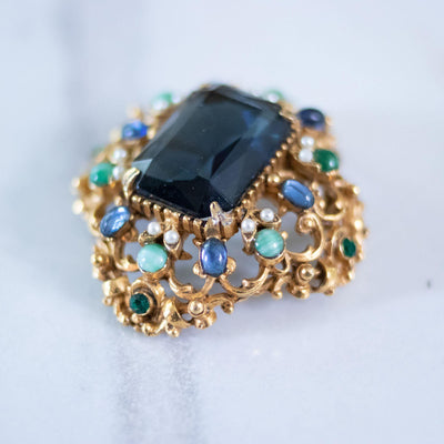 Vintage Florenza Renaissance Revival Ornate Brooch with Blue Crystal, Faux Pearls, and Rhinestones by Florenza - Vintage Meet Modern Vintage Jewelry - Chicago, Illinois - #oldhollywoodglamour #vintagemeetmodern #designervintage #jewelrybox #antiquejewelry #vintagejewelry