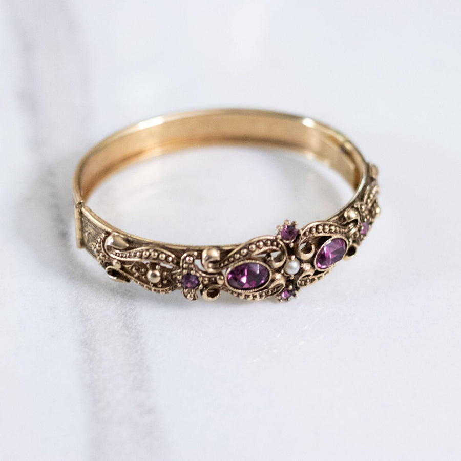 Vintage Victorian Revival Hinged Bangle Bracelet with Purple Rhinestones and Faux Pearls by Unsigned Beauty - Vintage Meet Modern Vintage Jewelry - Chicago, Illinois - #oldhollywoodglamour #vintagemeetmodern #designervintage #jewelrybox #antiquejewelry #vintagejewelry