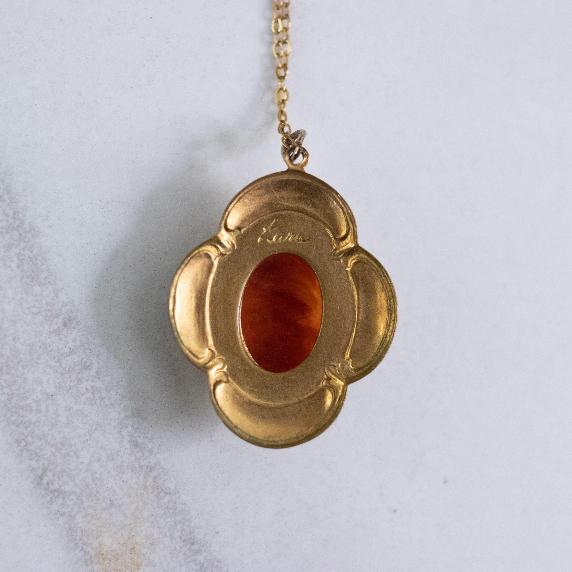 Vintage Kara Cameo Pendant Necklace with Black and Gold Setting by Kara - Vintage Meet Modern Vintage Jewelry - Chicago, Illinois - #oldhollywoodglamour #vintagemeetmodern #designervintage #jewelrybox #antiquejewelry #vintagejewelry