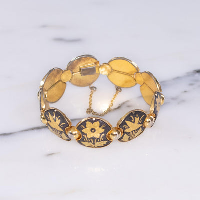 Vintage Damascene Gold and Black Round Panel Link Bracelet with Flowers and Birds by Made in Spain - Vintage Meet Modern Vintage Jewelry - Chicago, Illinois - #oldhollywoodglamour #vintagemeetmodern #designervintage #jewelrybox #antiquejewelry #vintagejewelry
