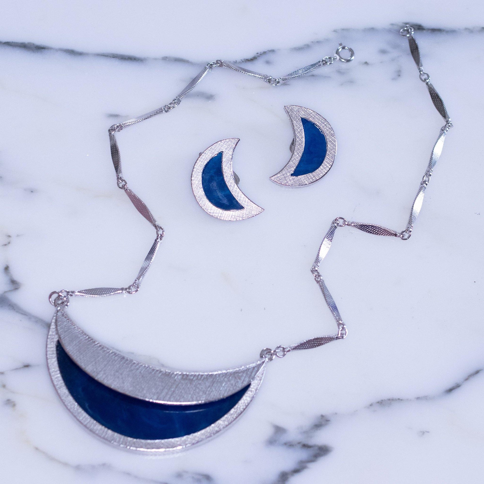 Vintage Berege Blue And Silver Crescent Pendant Necklace by Bergere - Vintage Meet Modern Vintage Jewelry - Chicago, Illinois - #oldhollywoodglamour #vintagemeetmodern #designervintage #jewelrybox #antiquejewelry #vintagejewelry