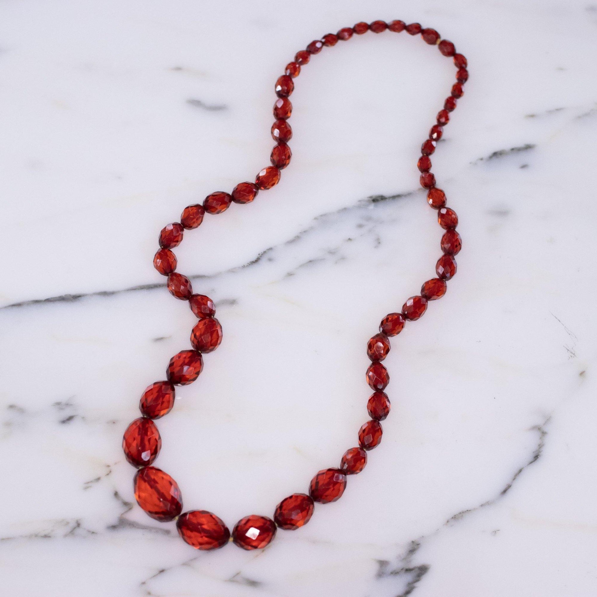 Vintage Cherry Juice Amber Bakelite Bead Necklace by Unsigned - Vintage Meet Modern Vintage Jewelry - Chicago, Illinois - #oldhollywoodglamour #vintagemeetmodern #designervintage #jewelrybox #antiquejewelry #vintagejewelry
