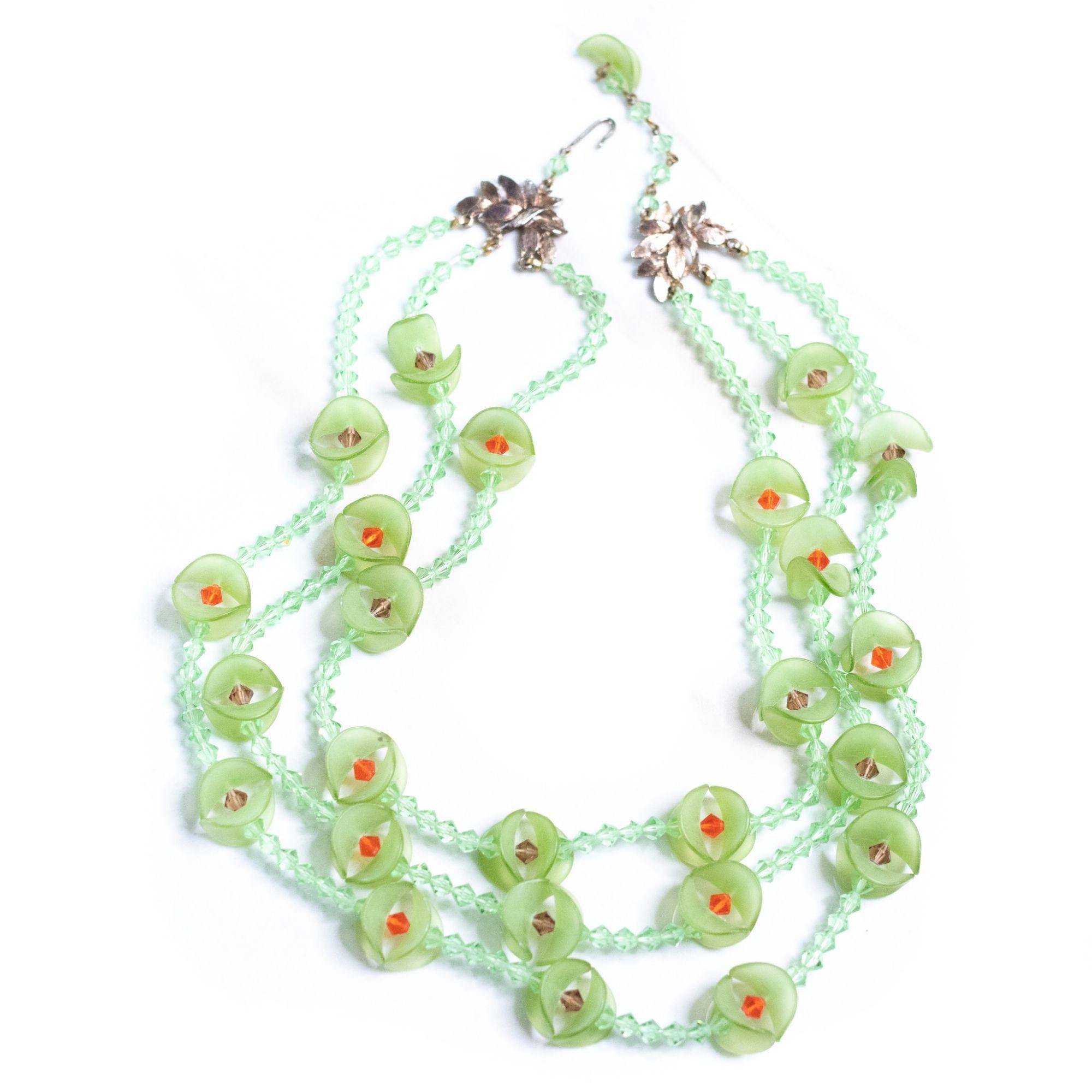 Vintage Green Fluted Lucite and Green, Red Crystal Beaded Triple Strand Necklace by Unsigned Beauty - Vintage Meet Modern Vintage Jewelry - Chicago, Illinois - #oldhollywoodglamour #vintagemeetmodern #designervintage #jewelrybox #antiquejewelry #vintagejewelry